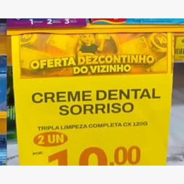 Recorte do encarte de Creme Dental Tripla Limpeza Completa Sorriso 120 g